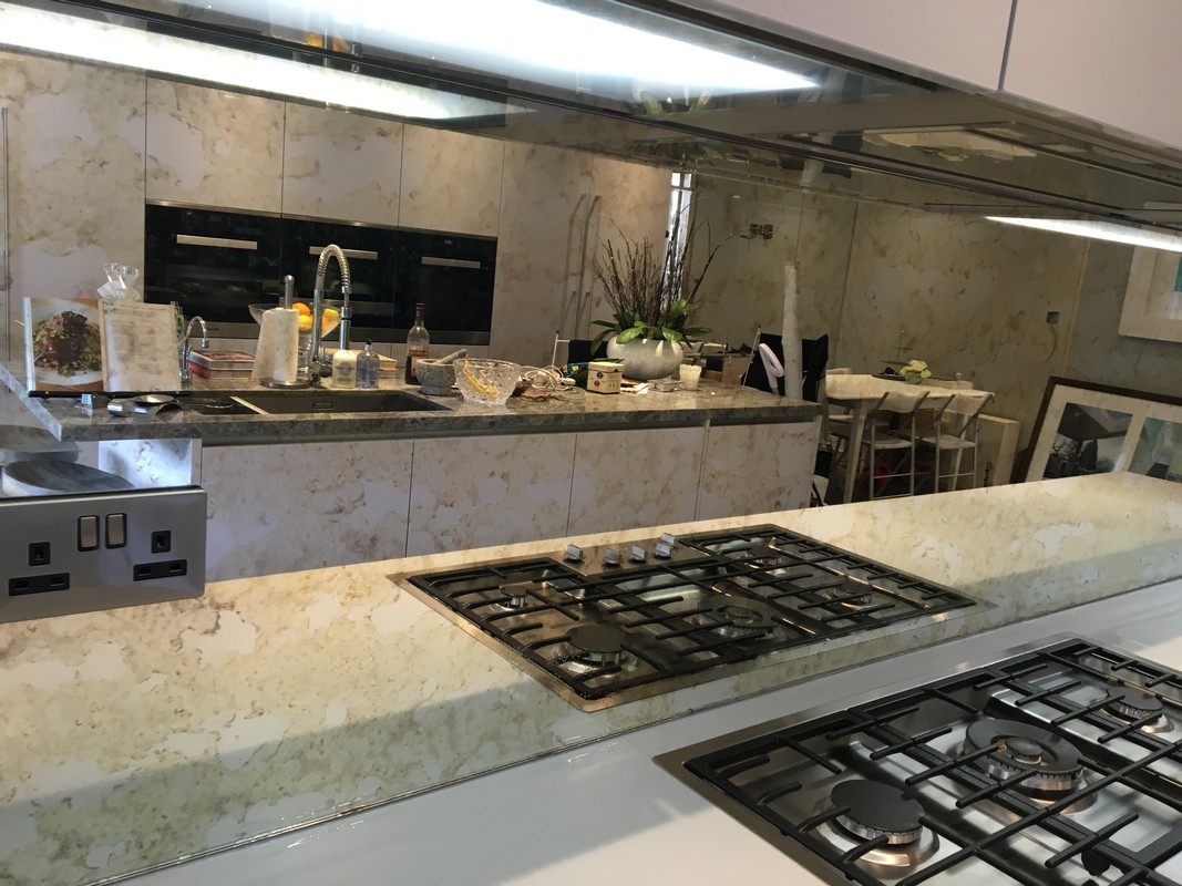 Mirror glass splashback in Camberwell luxury kitchen
