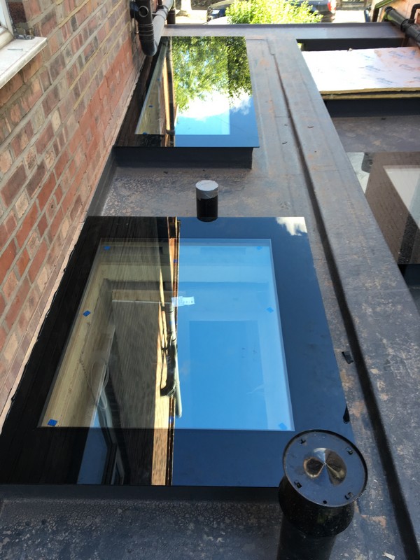 Multiple flat roof skylights on extension in Camberwell